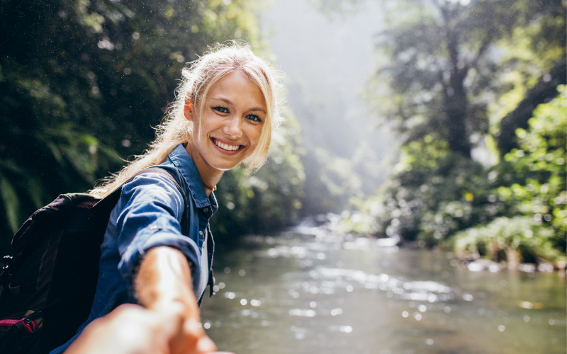 Woman dnjoying ther healing power of nature