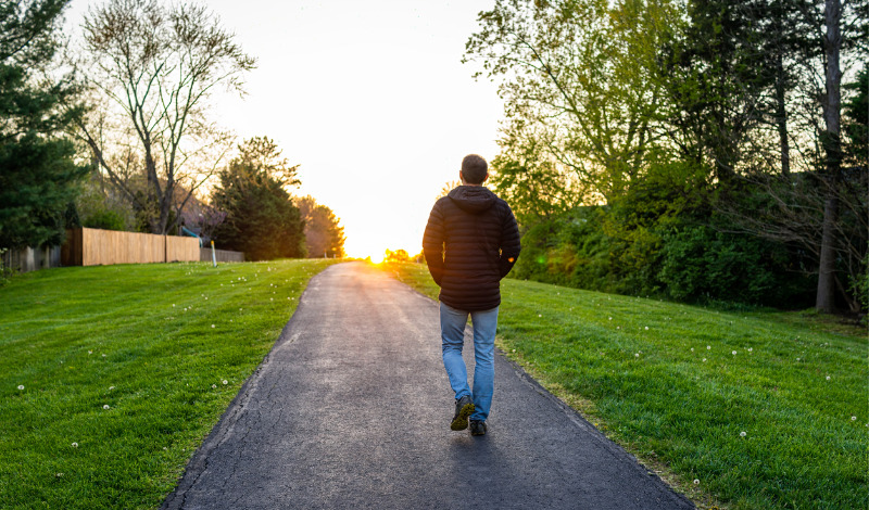 Man walking outside in support of mental health